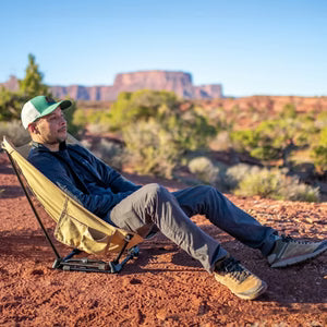 Man relaxing in a desert camp chair