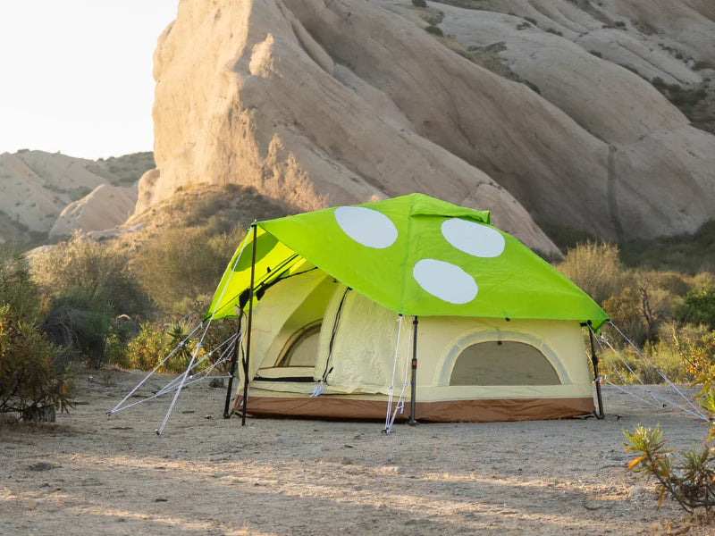 Kinoko Mushroom Tent (S): bright green polka-dot tent in desert